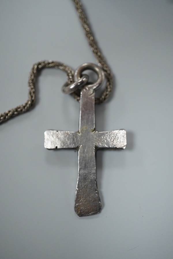 Michael Allen Bolton, a silver cross pendant and a pair of earrings, comprising: a cross pendant of textured design, length 5.1cm, British hallmarks for silver, sponsor's mark MAB, date letter for 1977, on a silver chain